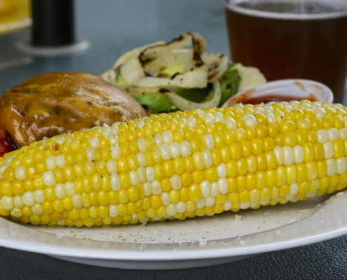 burger plate with corn cob